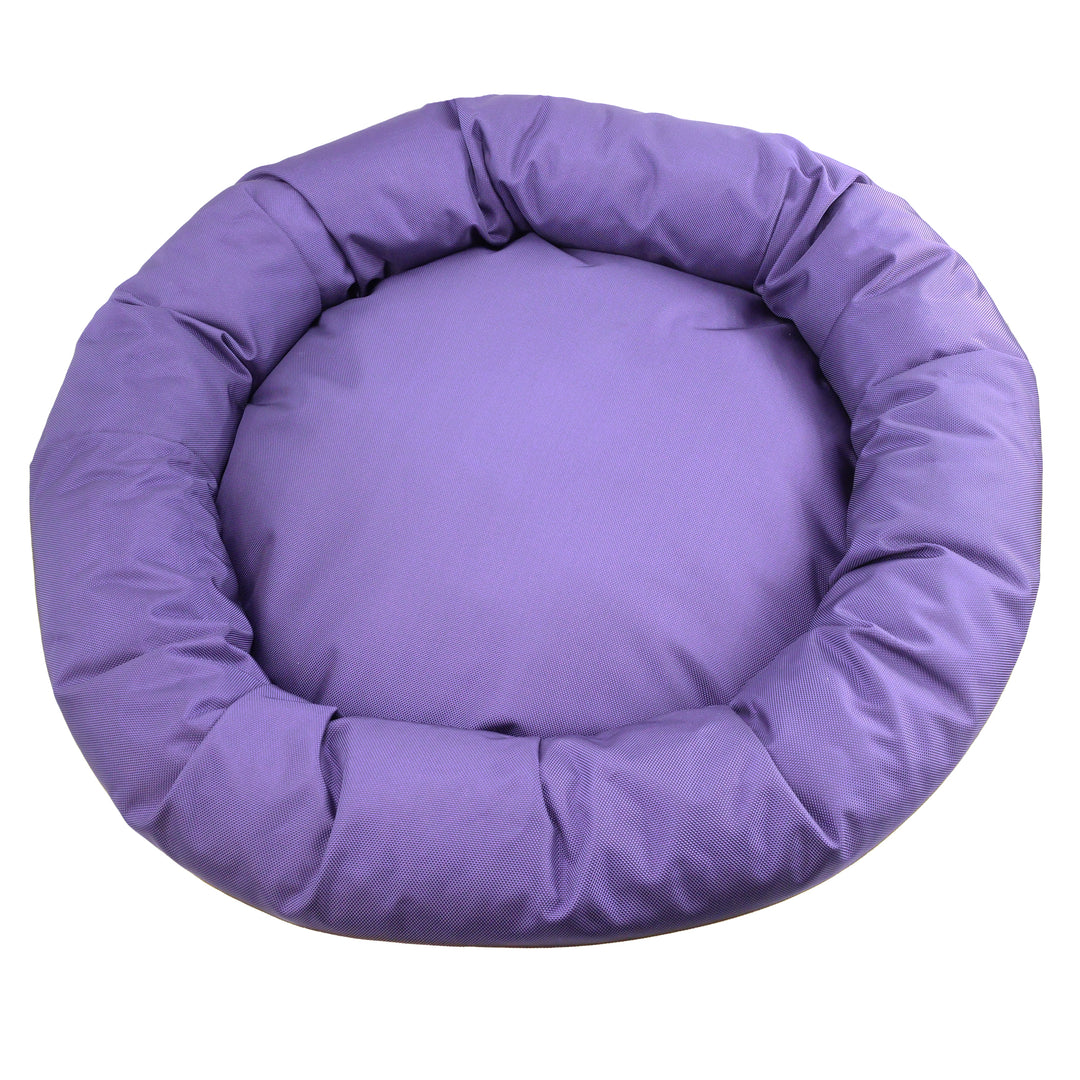 Top view of purple round bolstered dog bed.