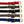 Close up on red, olive, black, coyote & navy seatbelt dog collars with brass hardware