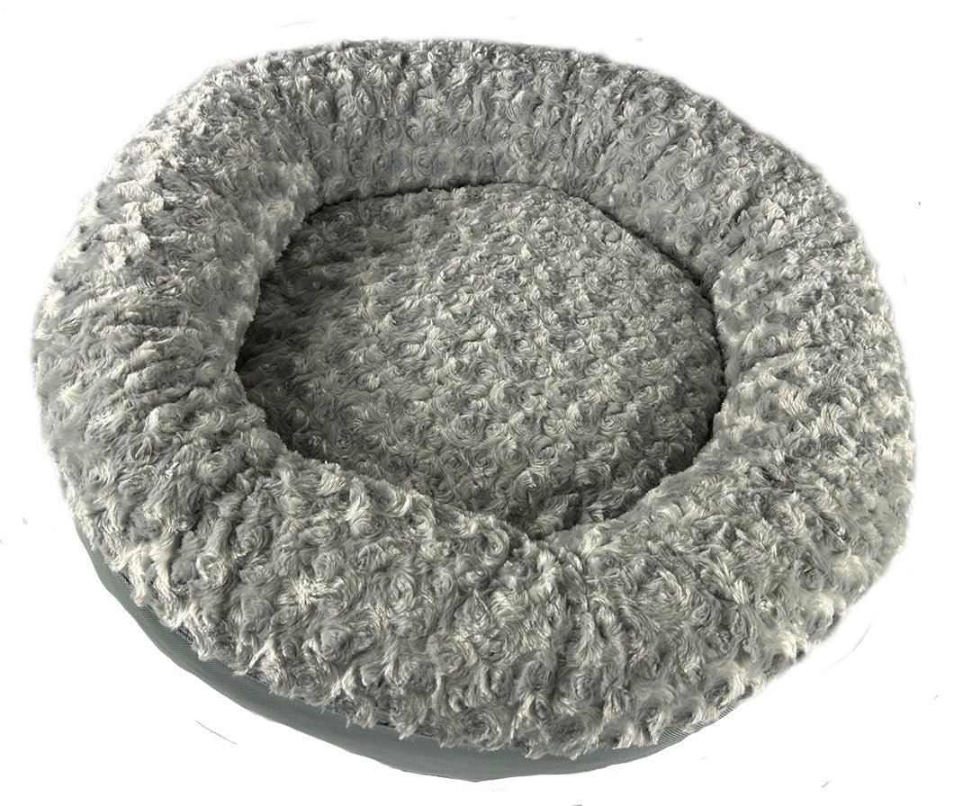 Round fuzzy silver bolster bed top view