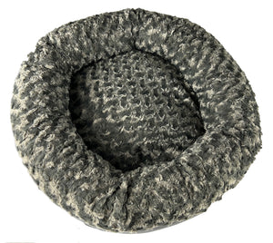 Round fuzzy charcoal bolster dog bed top view